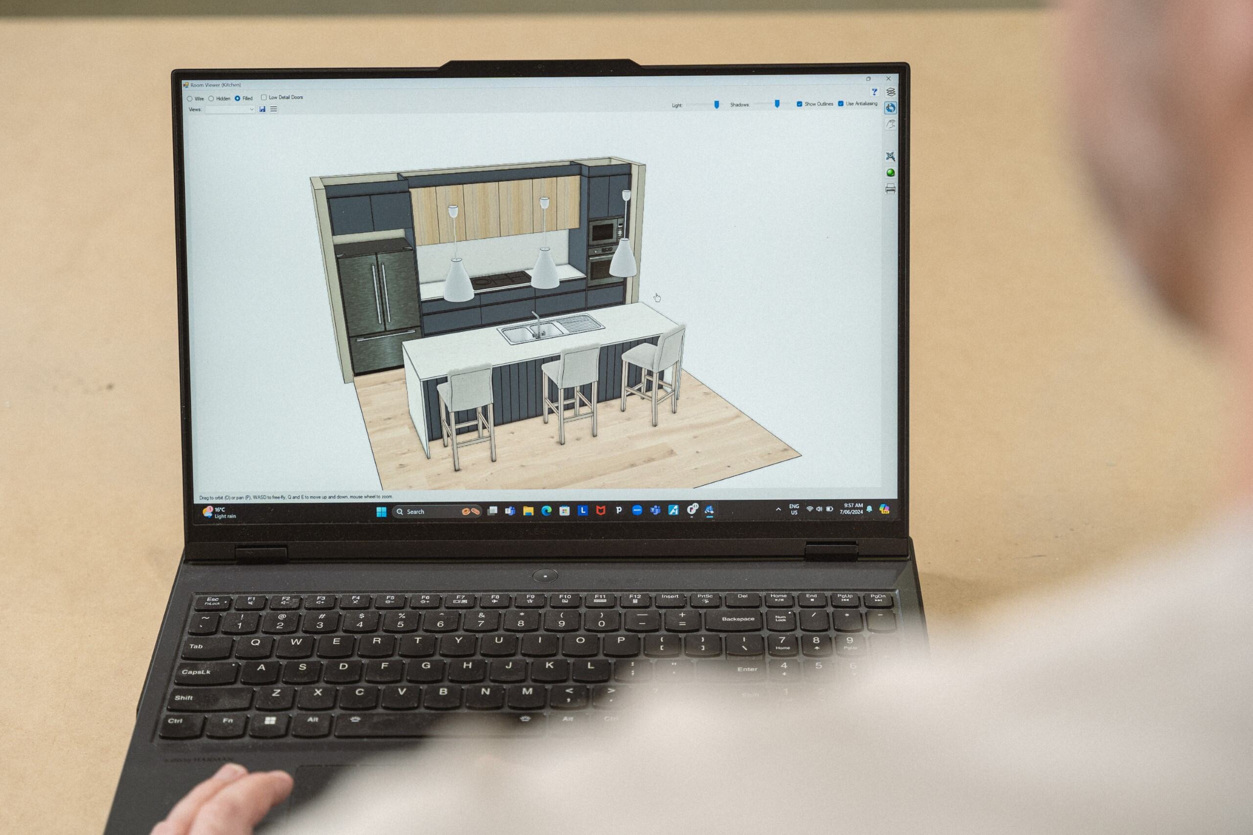 A man is working on a laptop